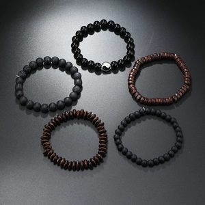 Five-piece beaded bracelet set featuring natural lava stone, wood beads, and Tai Chi charm