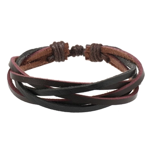 Detailed macro view of woven multi-layer leather bracelets with rustic cord knot closure