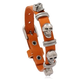 Punk orange leather bracelet with skull studs and a classic metal buckle for men