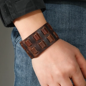 Vintage dark brown wide leather bracelet for men featuring embossed rectangular textures