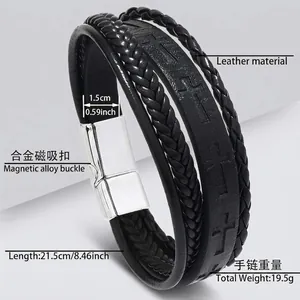 Macro detail of men's leather bracelet with cross pattern and magnetic clasp closure