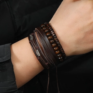 Men's vintage layered leather bracelet with dark wood beads and silver metal accents