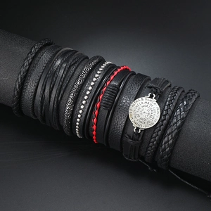 Multi-layer leather bracelet with compass charm and engraved religious metal plate