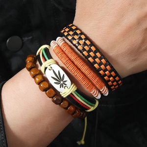 Men's bohemian layered bracelet set with woven leather and metallic leaf charm