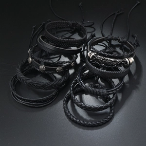 Vintage black leather braided bracelet set for men with silver feather and star charms