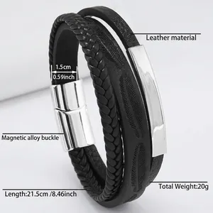 Detailed view of men's leather bracelet with feather texture and silver magnetic clasp