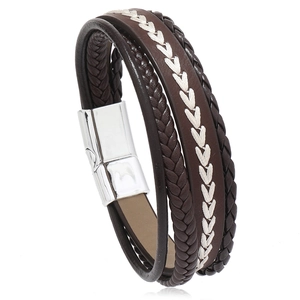 Detail of multi-layer leather bracelet with wheat pattern weave and magnetic metal clasp