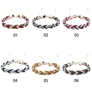 Detailed view of six braided cotton rope bracelets in various multi-color patterns