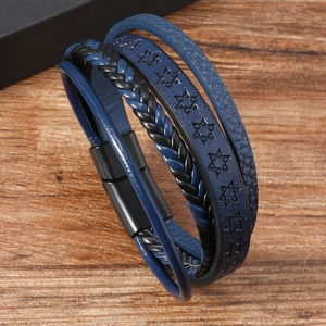 Detail of blue leather multi-layer braided bracelet with hexagram motifs and magnetic clasp