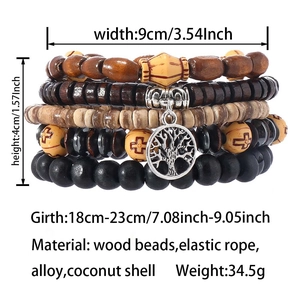 Macro shot of 5-layer stacked beaded bracelet featuring wood, coconut shell and tree of life charm