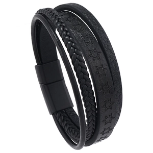 Close-up of black braided leather bracelet with embossed hexagram patterns and magnetic clasp