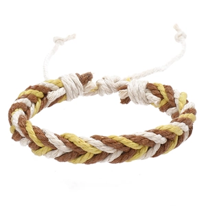 Close-up of woven cotton rope bracelet in white, brown and yellow with adjustable knots