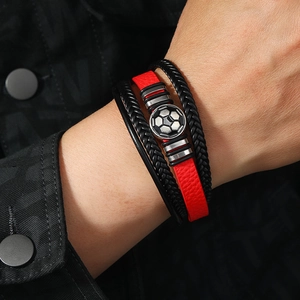 Men's multilayer leather bracelet with a metal soccer charm and secure magnetic clasp