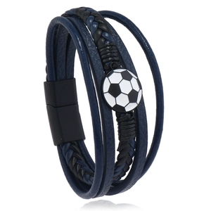 Detail of multi-layer leather bracelet with magnetic clasp and football charm