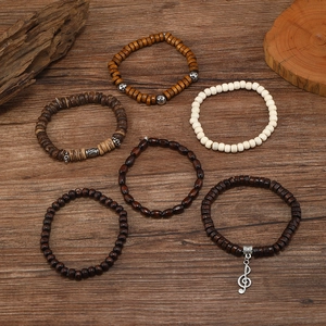 6-piece men's wooden bead bracelet set with musical note charm on a vintage wood background