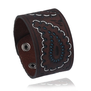 Brown leather cuff bracelet with paisley pattern and silver metal snap closures