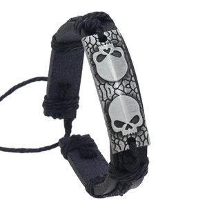 Bracelet pour homme en cuir tressé avec crânes et plaque en métal argenté