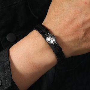 Vintage style men's braided leather bracelet with silver soccer ball metal charm