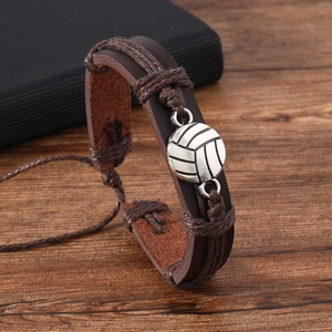 Detailed macro view of woven brown leather volleyball bracelet with adjustable cord strap