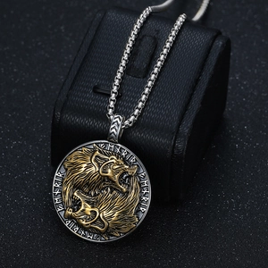 Gold-plated viking necklace with lion totem pendant and box chain on black display