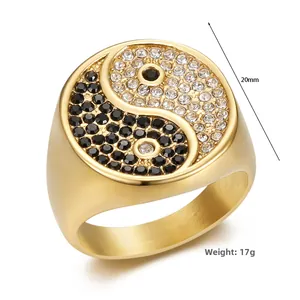 Detail of gold-plated stainless steel ring featuring yin yang black and white zircon pavé