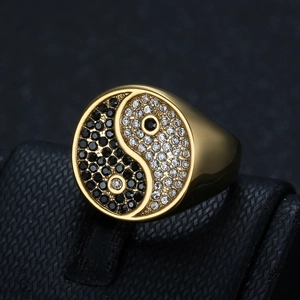 Gold plated stainless steel ring with yin yang symbol set with black and white diamonds