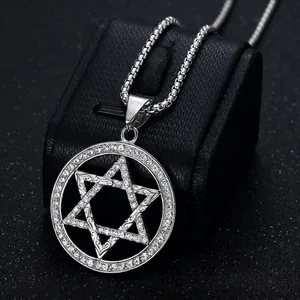 Silver hexagram pendant necklace with sparkling rhinestones and box chain on display
