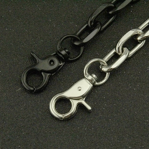 Detail of silver and black oval Cuban link chains with sturdy lobster clasps
