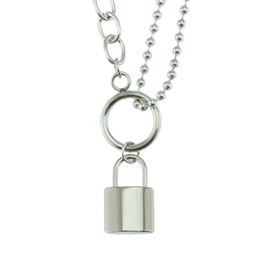 Detailed view of silver lock pendant with mixed curb and bead chain necklace design