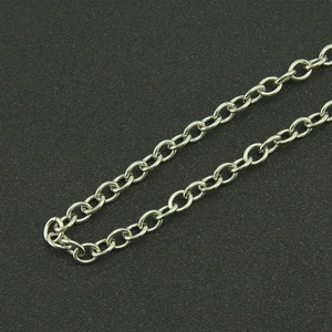 Punk style multi-layer silver metal cable chain with skull and bullet accents for jeans