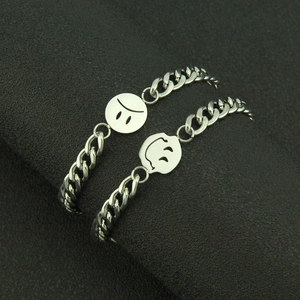 Unisex silver cuban chain bracelets featuring hollow smiley and sad face round charms