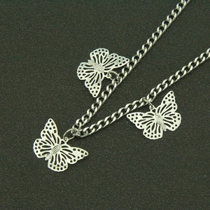 Silver punk style trouser chain featuring three intricate hollow butterfly charms