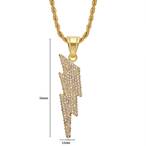 Macro shot of 56mm lightning bolt pendant with pavé crystals on a gold rope chain