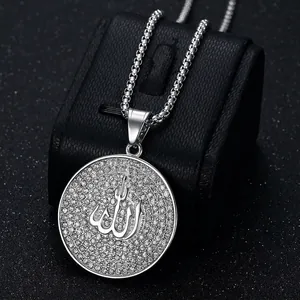 Silver Allah pendant necklace with sparkling rhinestones on a professional black stand