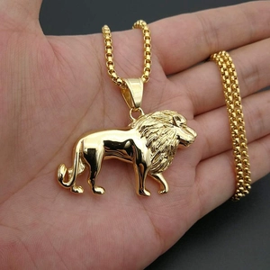 Golden lion pendant necklace with polished hiphop style lion head on a box chain