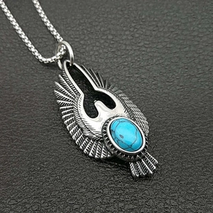 Vintage 316L stainless steel eagle pendant with turquoise inlay on black leather
