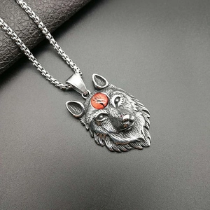Vintage Viking wolf head pendant necklace in stainless steel with a red gemstone accent