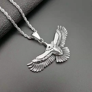 Vintage eagle pendant necklace in polished steel with detailed feather texture