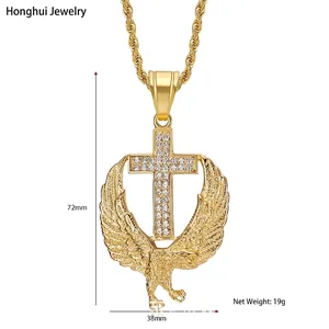 Detail view of a gold-plated eagle cross pendant with dimension lines 72mm by 38mm