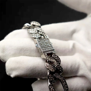 Close-up of hip-hop silver Cuban link necklace with iced out rhinestones and secure clasp