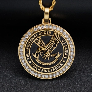Philippine Eagle medallion necklace in gold finish with crystals and black enamel