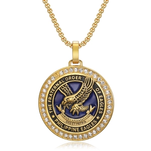 Gold Philippine Eagle pendant necklace with blue enamel and sparkling crystal border