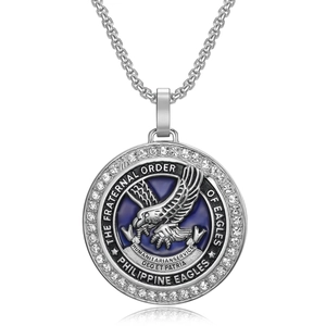 Silver eagle pendant necklace with blue enamel and sparkling crystals on a chain
