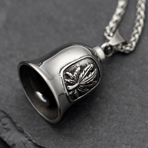 Retro punk motorcycle maple leaf rider bell necklace on dark stone background
