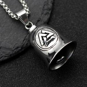 Pendentif cloche Viking Valknut en acier inoxydable vintage sur fond de roche noire