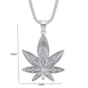 Macro detail of silver maple leaf pendant with pavé crystals measuring 62mm by 43mm