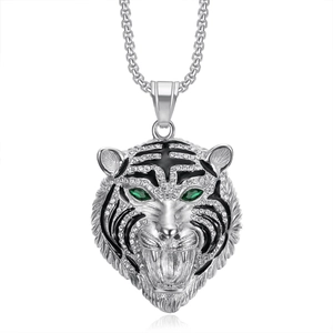 Silver tiger head pendant with green gem eyes and sparkling white rhinestones