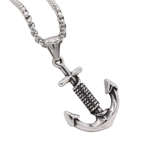 Vintage silver anchor necklace with cross and rope detail on a steel box chain