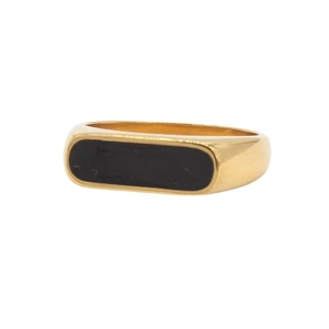 Detailed close-up of a gold signet ring with a rectangular black enamel inlay surface
