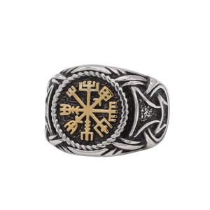 Close-up of vintage Viking compass ring with golden Vegvísir and Celtic knot details